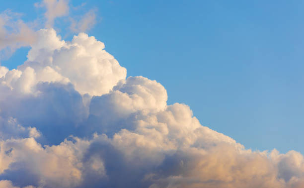 istock Late afternoon, cumulus clouds under a blue sky. 2163712133