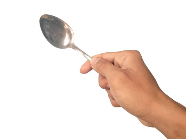 Guy Using Spoon 7,100+ Man Holding Spoon Stock Photos, Pictures & Royalty-Free Images ...