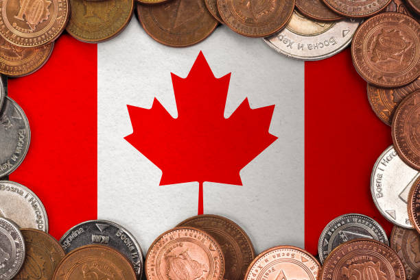 istock Coins on flag of Canada 2163717121