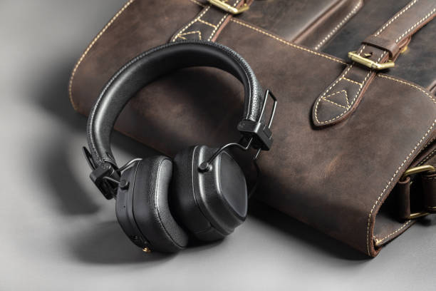 istock Headphones and bag, shadow, light background. 2163717165