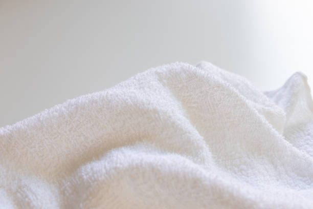 istock Fluffy and soft white towel 2163717368