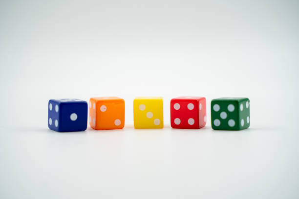 Colorful game dice isolated over white background.