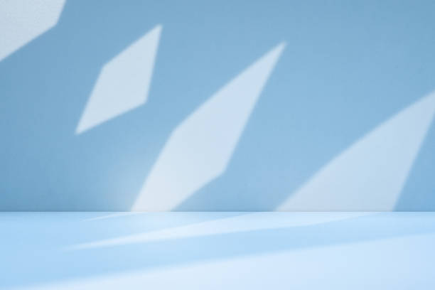 istock Studio style background wall decoration presentation uses white and blue tones. with shadows cast from a nearby window, concept creating a decorative 2163724093