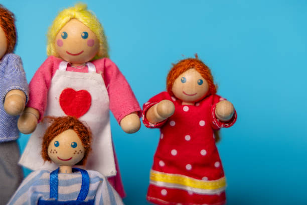istock Toy Family on Blue background 2163724267