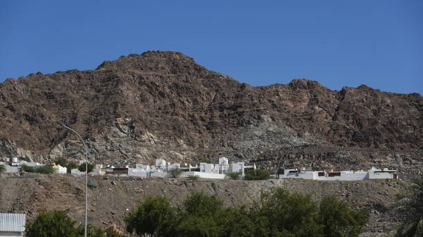 istock Rugged Mountain Landscape With White Houses Clear Sky Day 2163724448