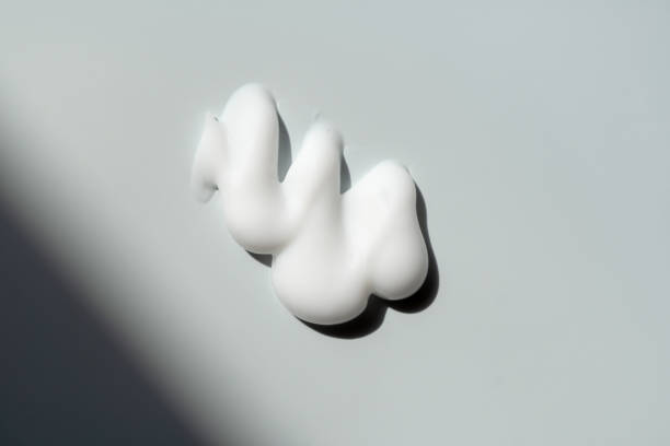 istock A smear of cream on a light background. Beauty concept. 2163724937