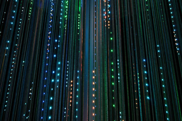 istock Fiber optics background with lots of light spots 2163726460