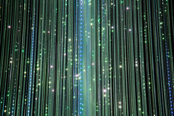 istock Fiber optics background with lots of light spots 2163726474