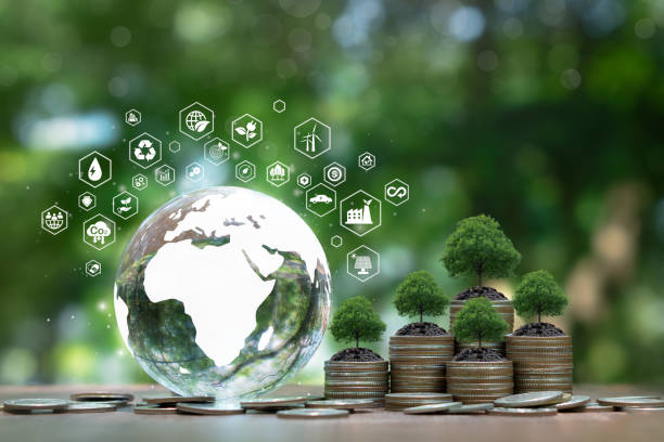 istock Crystal earth with icon and tree are growing on stack coins Green business concept.Renewable Energy.Environmental protection. Investment for sustainability and carbon credit. ESG, co2 tax. 2163728749