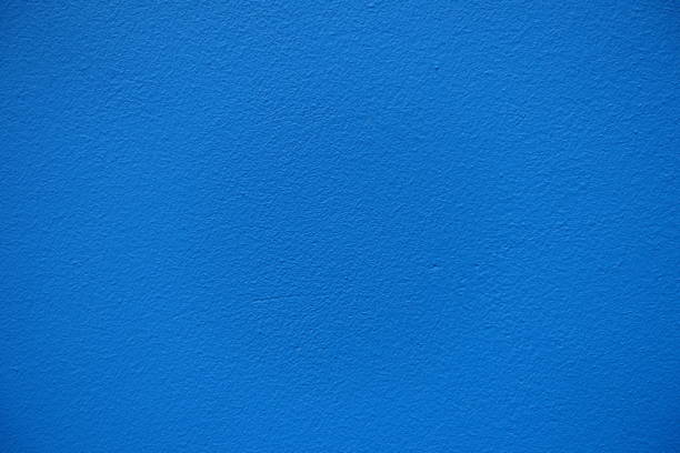 Macro of bright electric blue painted wall