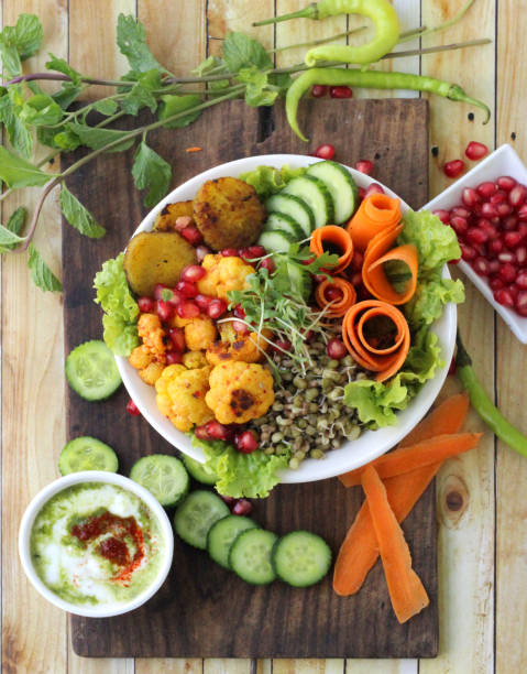 istock Buddha rainbow salad bowl with micro greens 2163732474