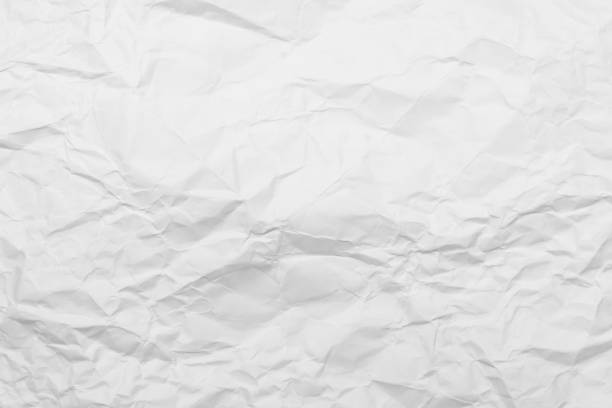 istock White Paper Texture background. Crumpled white paper abstract shape background with space paper recycle for text 2163734338
