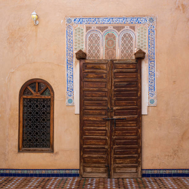 istock Typical decorated Moroccan door and window with intricate decoration. 2163735007