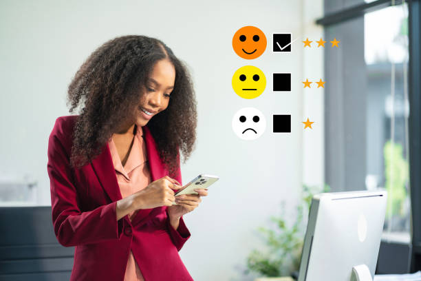 istock Happy Client customer experience concept. Woman recording phone inquiry with checkboxes, smiling face rating excellent for satisfaction survey. 2163735672