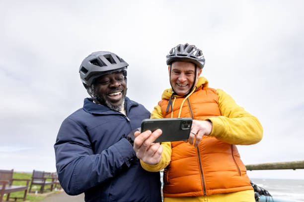 istock Cycling Buddies Check Out Their Selfie 2163739755