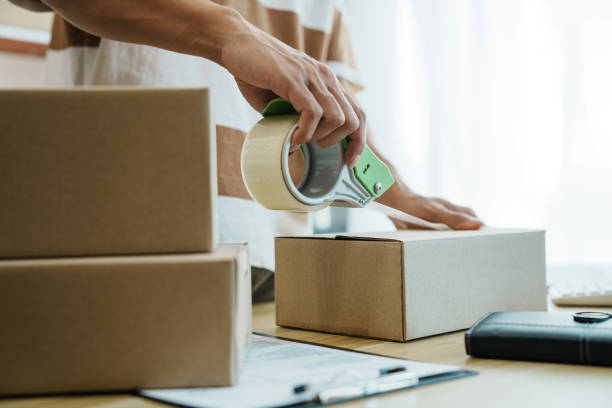istock ecommerce and delivery service concept. Asian man retail online. 2163739870