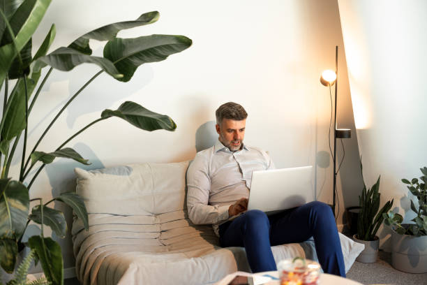 istock Businessman using laptop in office 2163742995