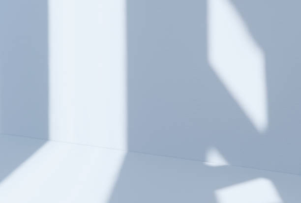 istock Blue Background,Studio Room with Podium Stand for product presentation. Empty Display mock up with light,shadows of window on blue wall texture for Winter sale,promotion 2163743878