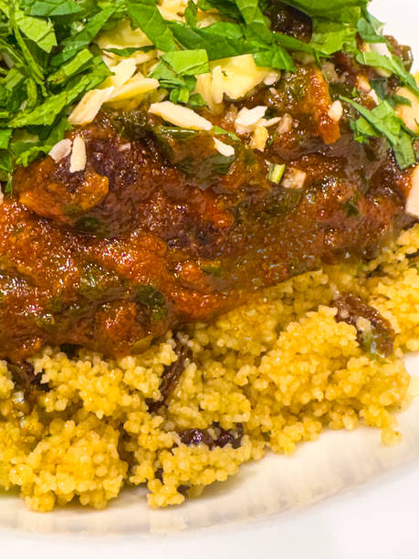 Haloumi cheese stew made with tomato’s, spinach, and couscous