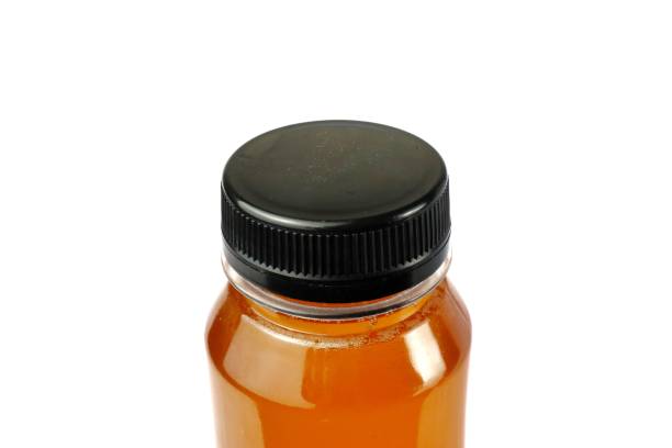 istock honey in white isolated bottle 2163750900