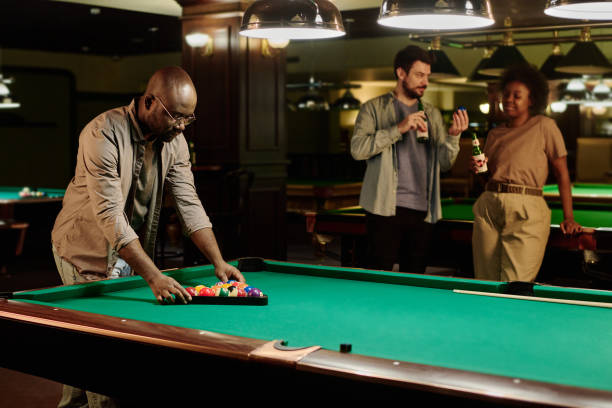 istock Man preparing for game against friends 2163752804