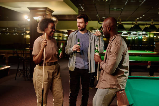 istock Having beer and chatting after billiards 2163752821