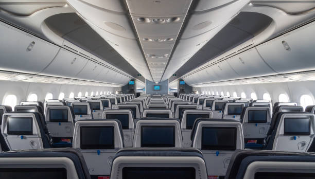 Interior Of Airplane Photo taken in Amsterdam, Netherlands airplane interior stock pictures, royalty-free photos & images