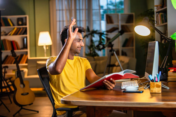istock Indian asian male college student studying at home 2163762668
