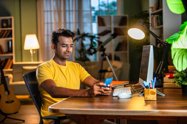 istock Indian asian male college student studying at home 2163762669