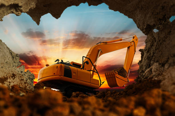 istock Crawler excavator are digging soil in the tunnel construction site. 2163763252