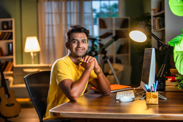 istock Indian asian male college student studying at home 2163763336