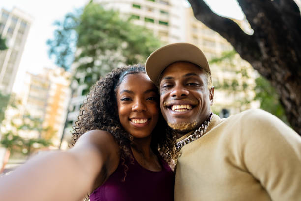 istock Young friends taking a selfie outdoors 2163763968
