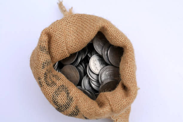 istock Burlap sack filled with Indian currency coin! 2163765304