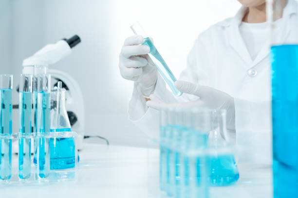 istock Scientist analyze biochemical sample in advanced scientific laboratory. Medical professional check chemical mix microbiological developmental of viral. Biotechnology research in science lab. cosmetic 2163767729