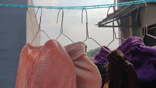 istock Group of clothes is dried in the sun 2163774414