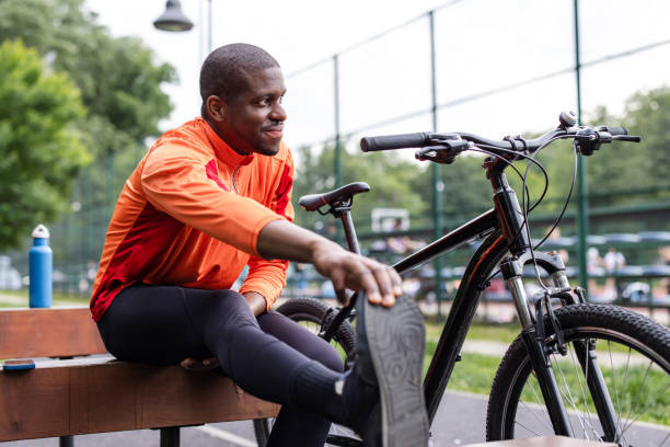 istock Man stretching in outdoor park before cycling 2163777020