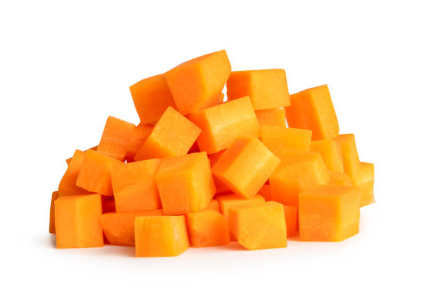 istock Orange carrot in cubes shape in stack isolated on white background with clipping path 2163787170