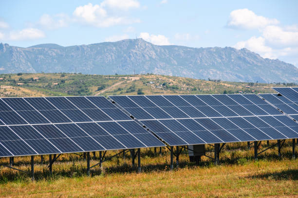 istock Solar panels in front of a mountain. 2163789106