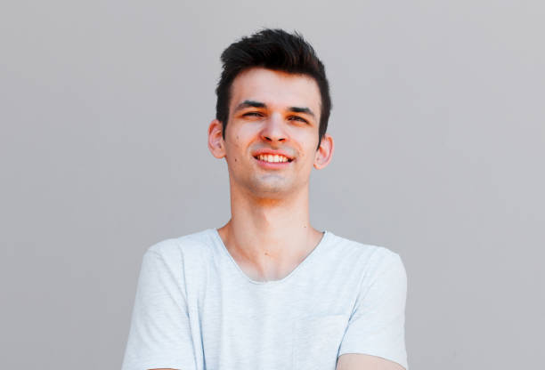 istock Good looking man, portrait on grey background 2163789455