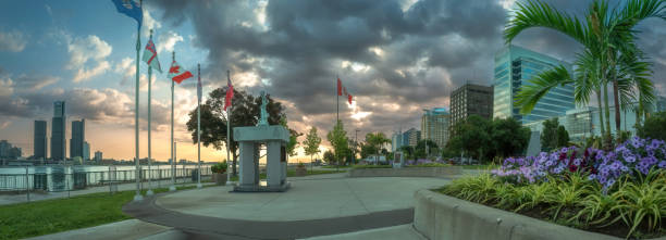 A view of both the Detroit and Windsor skylines at dawn.  Photo taken in Windsor, Ontario.  These border cities are separated by the Detroit River.