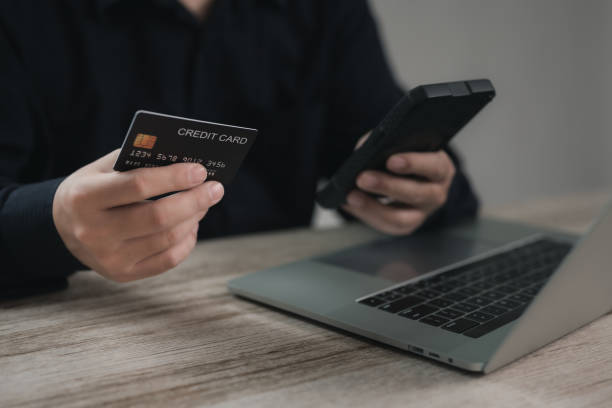 istock Concept e banking or e commerce : business man using his Laptop for payment by wallet app technology or digital money transfer after his shopping something by application . 2163796074