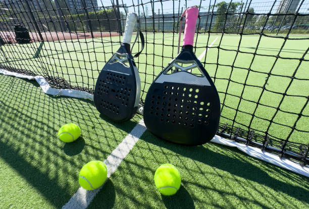 istock Paddle tennis still life. Racket, balls and turf 2163796891
