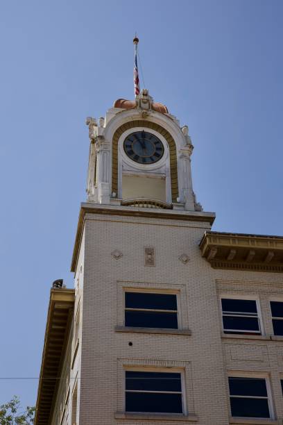 istock Beautiful ornate clock tower with domed roof 2163797070