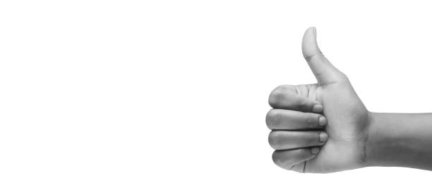 Thumbs up hand sign on white background