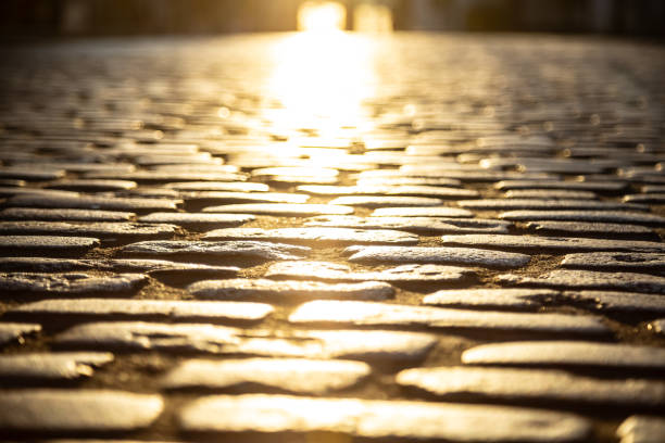 Early morning sunlight reflections Guildford High Street Surrey England Europe