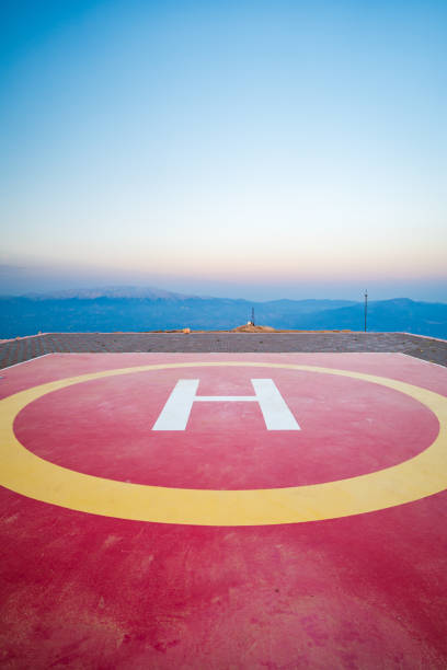 Helipad on mountain top, helicopter landing site on hill area