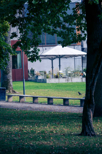 istock Empty outdoor servering area in park environment during autumn in Lund Sweden 2163802804