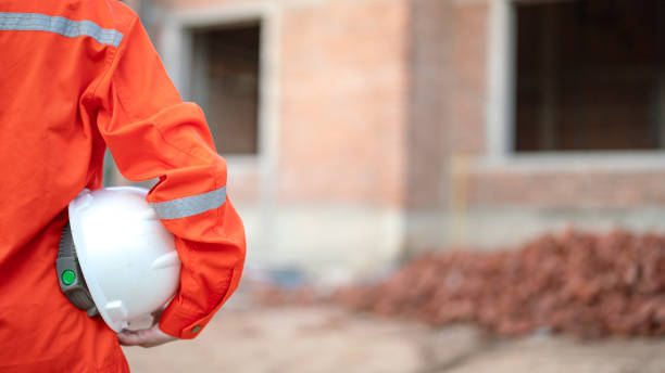 istock A construciton foreman with safety helmet at construction site. 2163804661
