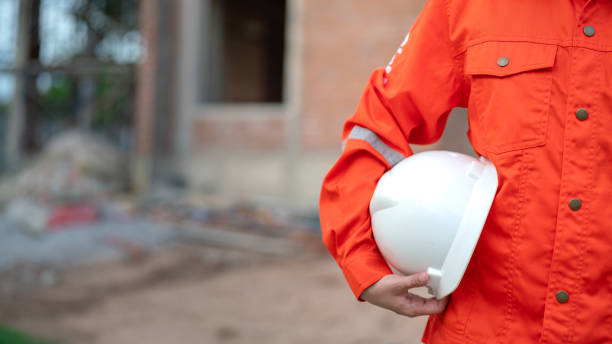istock A construciton foreman with safety helmet at construction site. 2163804664