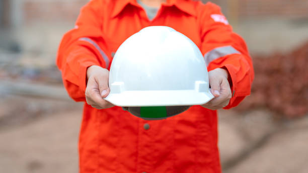 istock A construciton foreman with safety helmet at construction site. 2163804673